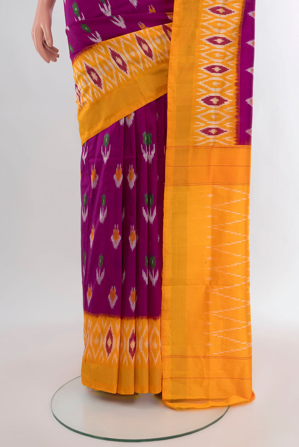 Pleats and pallu of Purple Pochampally Silk Saree with Pure Ikat on the body and Ikat Border. 