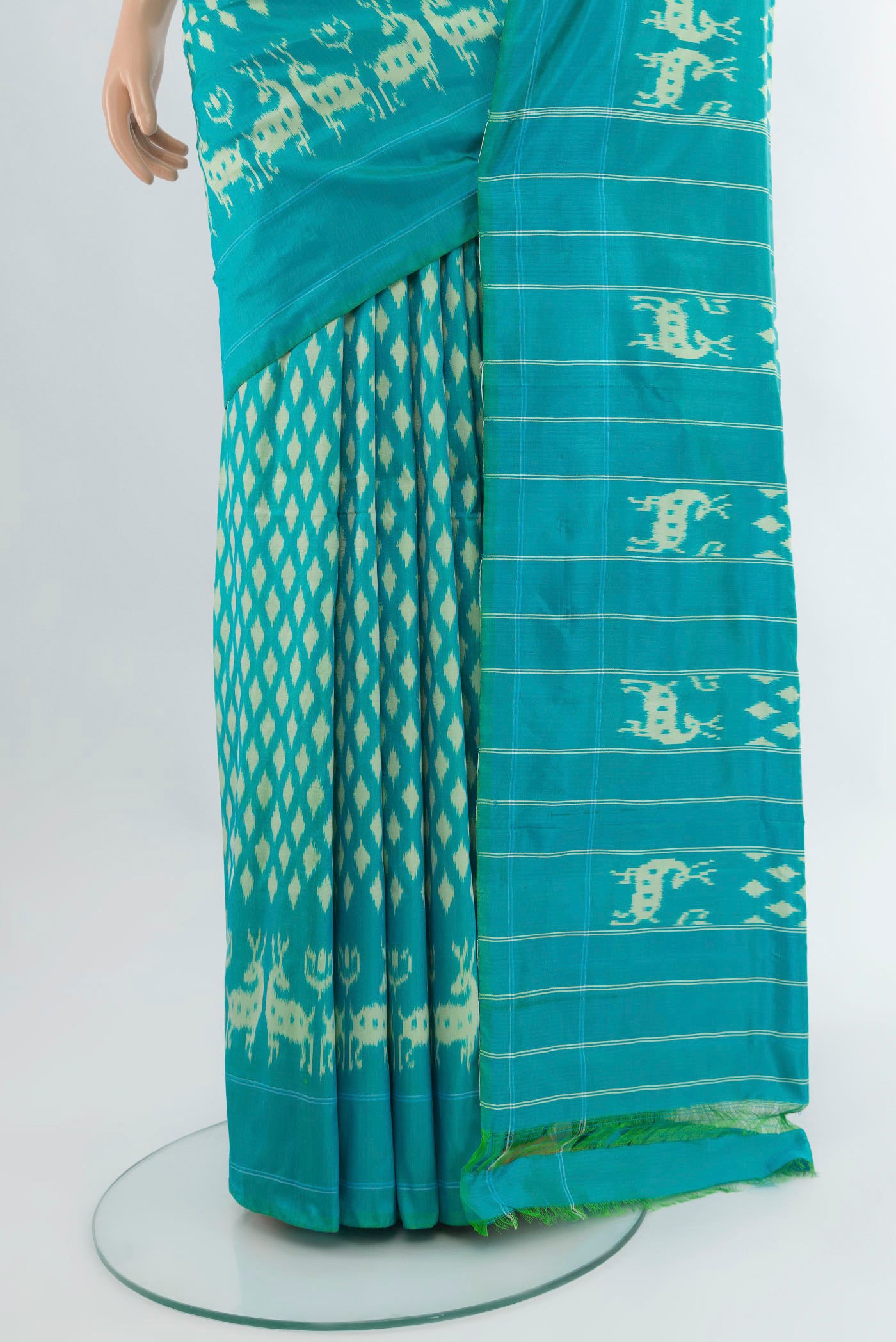 Pleats and pallu of Light Blue Pochampally Silk Saree with Pure Ikat on the body and Plain Border. 