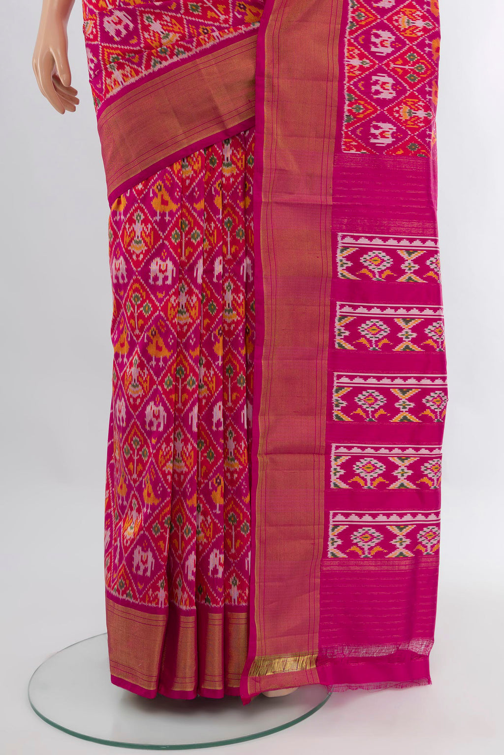 Pleats and pallu of Pink Pochampally Silk Saree with Ikat design on the body and Zari Border. 
