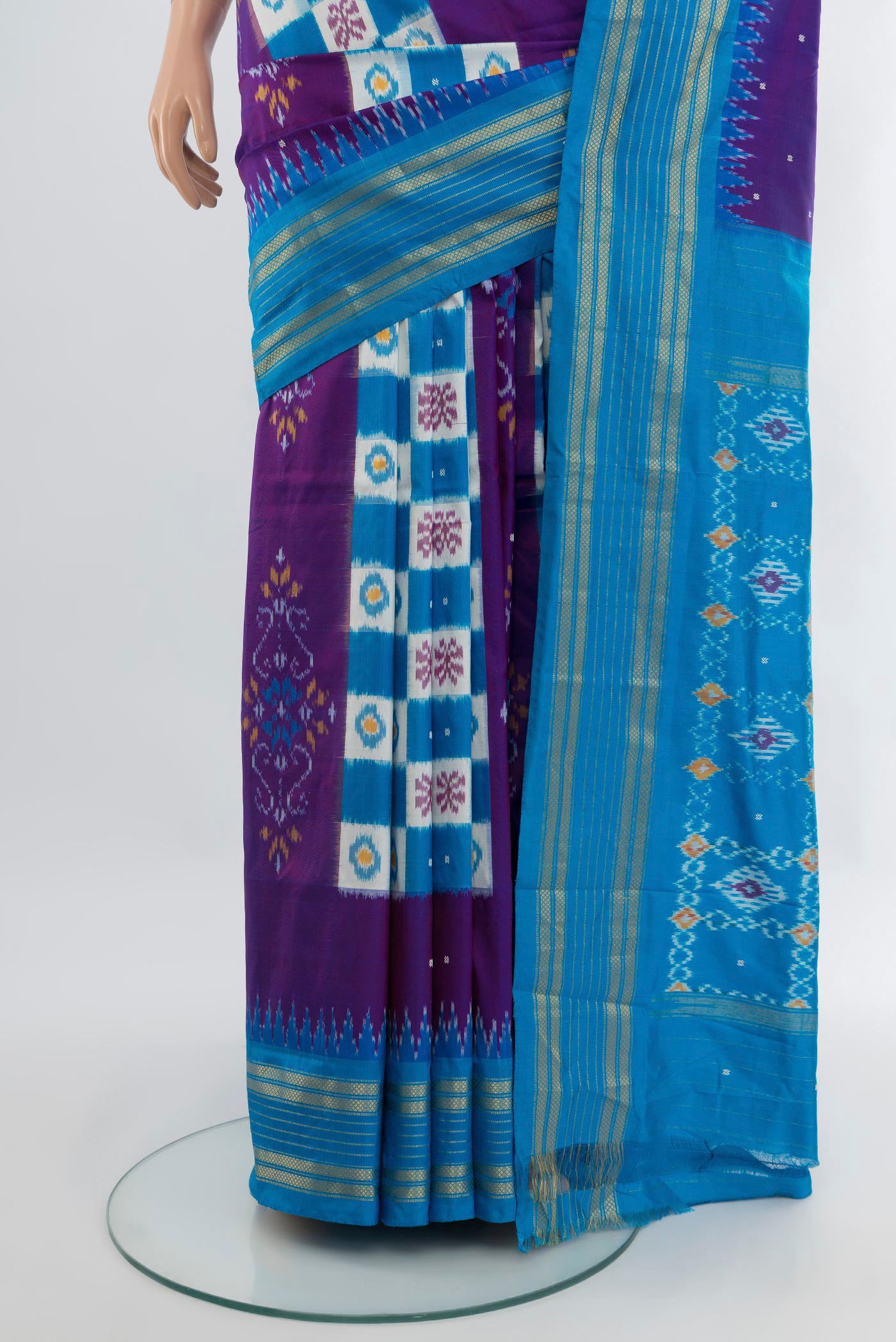 Pleats and pallu of Purple Pochampally Silk Saree with Pure Ikat on the body and Zari Border. 