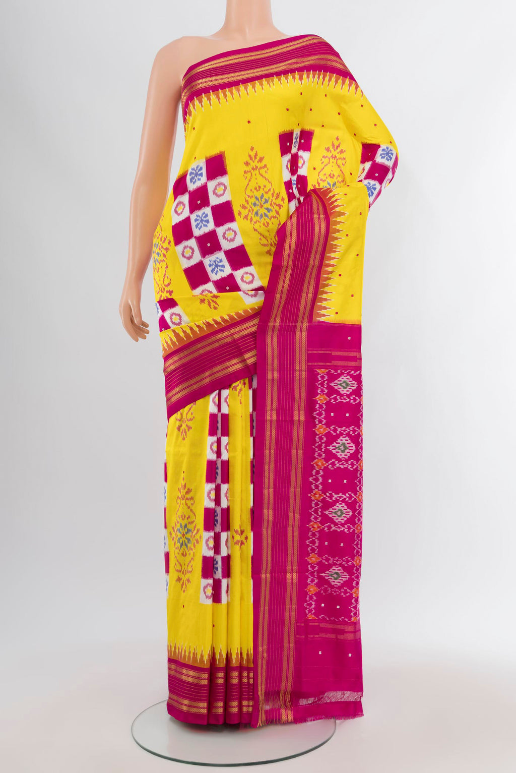 Yellow Pochampally Silk Saree with Pure Ikat on the body and Plain Border.  displayed on a mannequin