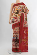 Golden Peach Pochampally Silk Saree with Pure Ikat on the body and Plain Border.  displayed on a mannequin