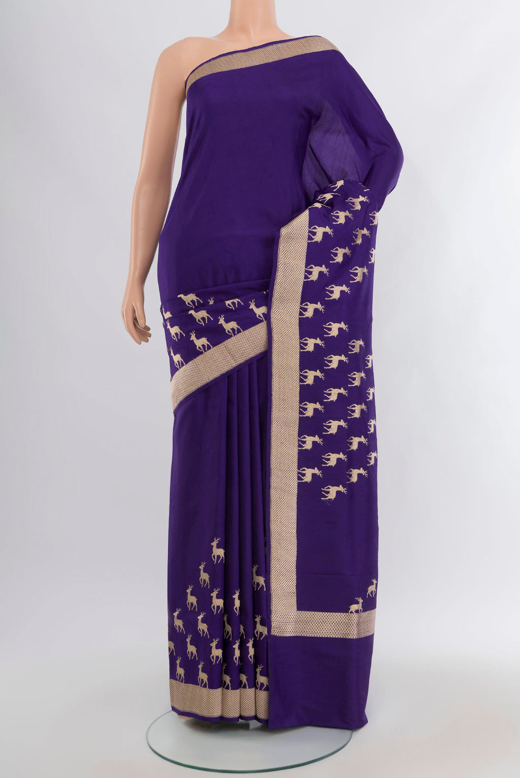 Navy Blue Banarasi Katan Silk Saree with Plain Body and Zari Border.  displayed on a mannequin