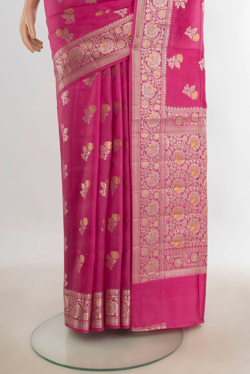 Pleats and pallu of Pure Silk Rose pink Banarasi Raw Saree with Zari Butta on the body and Silk Border. 