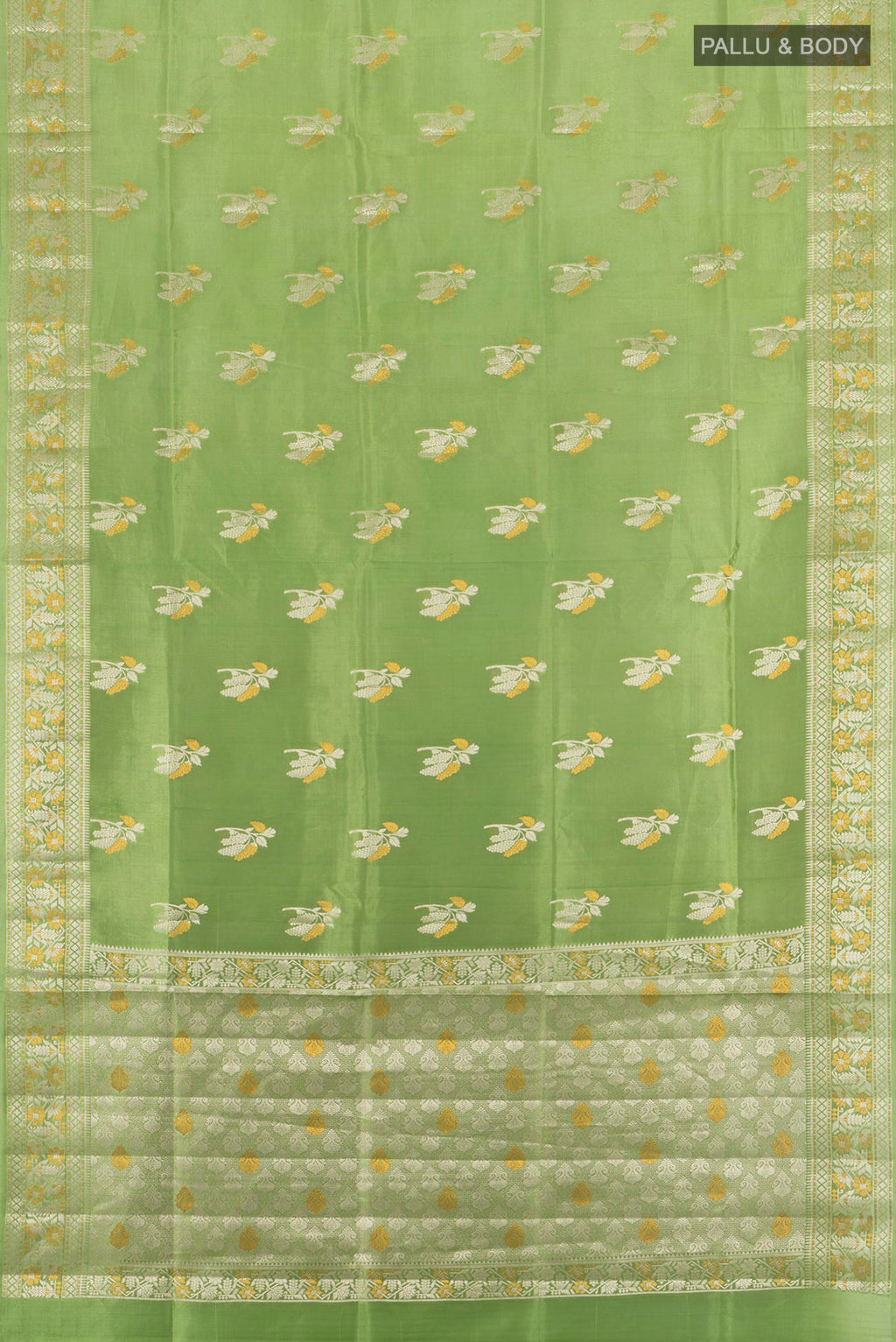 Flat view of Pista Green Banarasi Raw Silk Saree with Zari Butta on the body and Zari Border. 