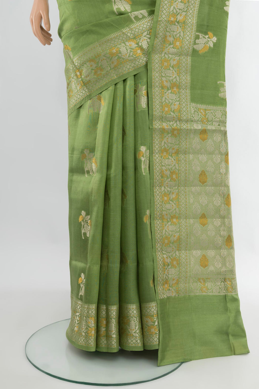 Pleats and pallu of Pista Green Banarasi Raw Silk Saree with Zari Butta on the body and Zari Border. 