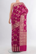 Purple Banarasi Raw Silk Saree with Zari Butta on the body and Silk Border.  displayed on a mannequin