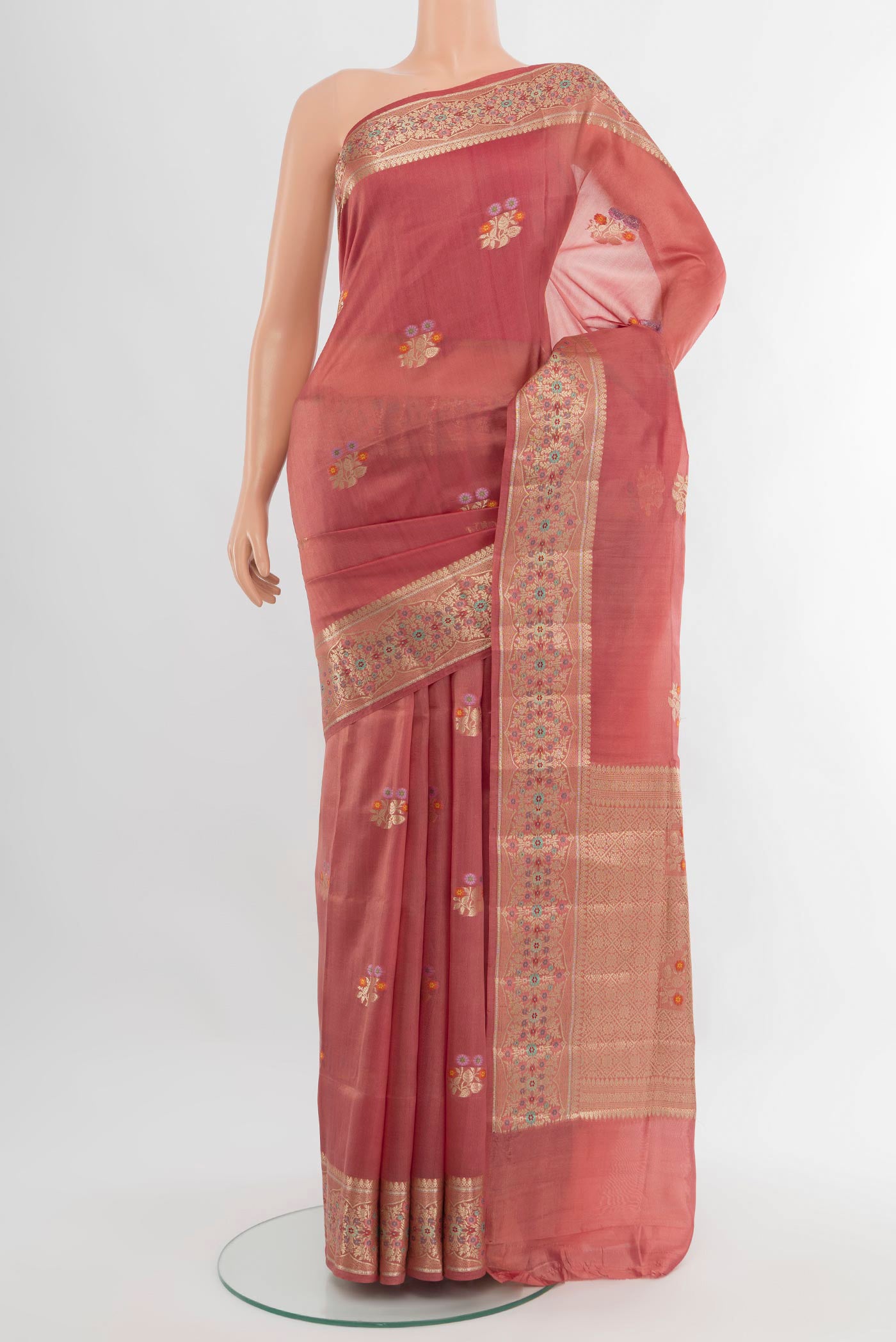 Coral Banarasi Raw Silk Saree with Zari Butta on the body and Zari Border.  displayed on a mannequin