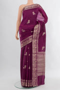 Magenta Banarasi Raw Silk Saree with Zari Butta on the body and Zari Border.  displayed on a mannequin