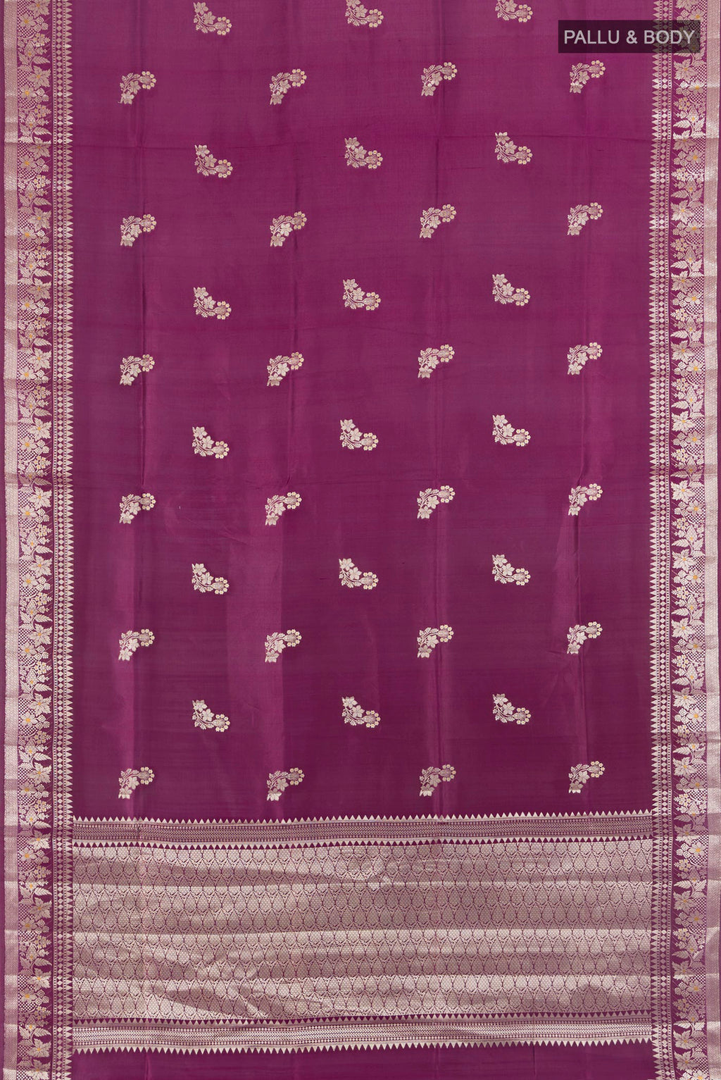 Flat view of Magenta Banarasi Raw Silk Saree with Zari Butta on the body and Zari Border. 