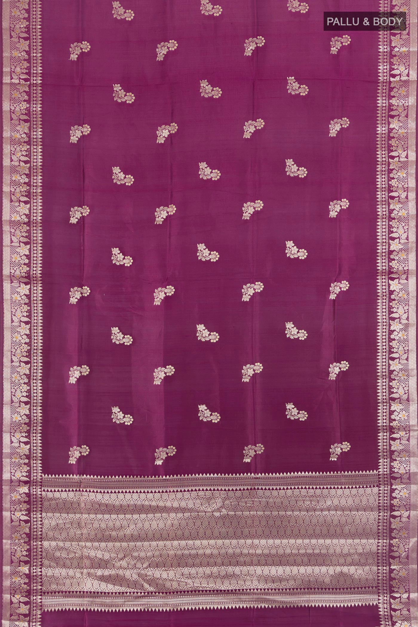 Flat view of Magenta Banarasi Raw Silk Saree with Zari Butta on the body and Zari Border. 