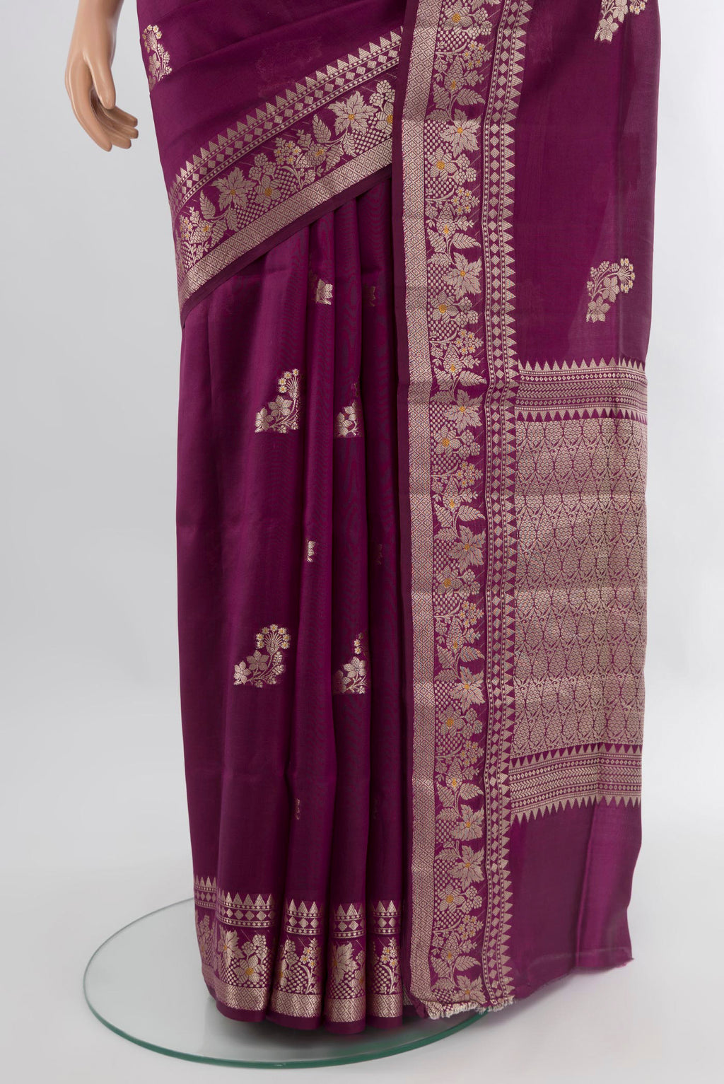 Pleats and pallu of Magenta Banarasi Raw Silk Saree with Zari Butta on the body and Zari Border. 