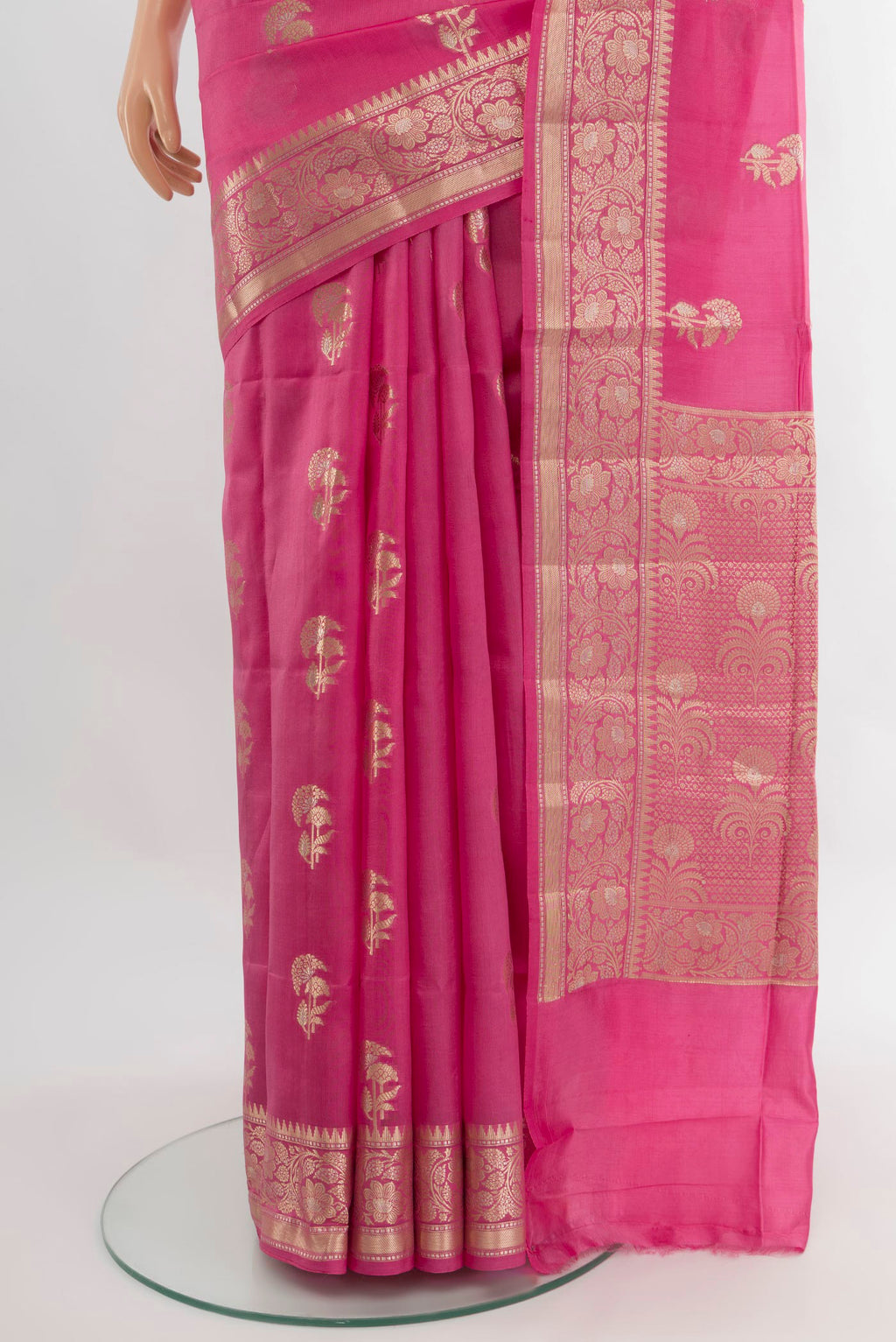 Pleats and pallu of Rose pink Banarasi Raw Silk Saree with Zari Butta on the body and Zari Border. 