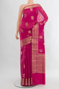 Rani Pink Banarasi Raw Silk Saree with Zari Butta on the body and Zari Border.  displayed on a mannequin