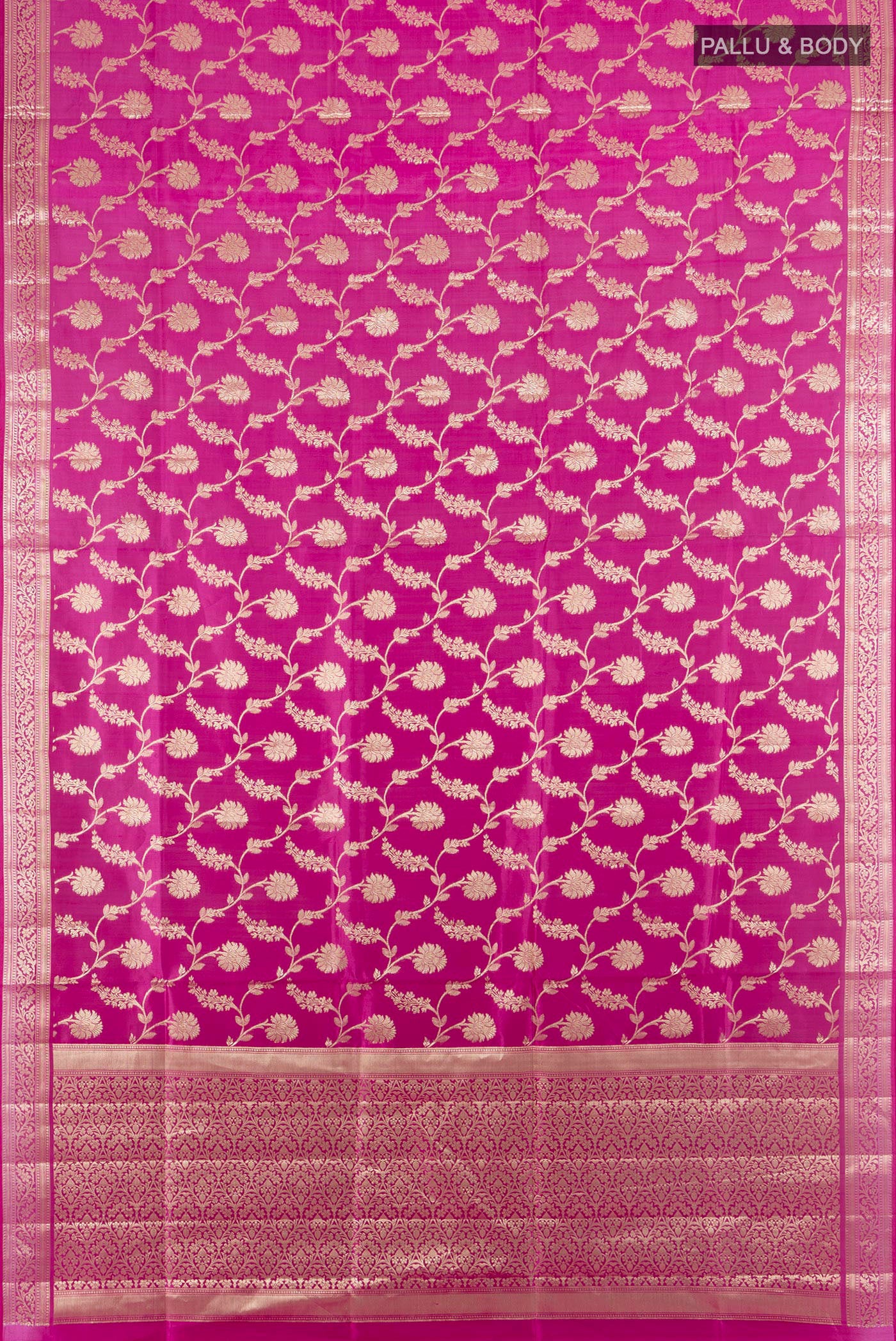 Flat view of Pure Silk Magenta Banarasi Raw Saree with Zari Butta on the body and Zari Border. 