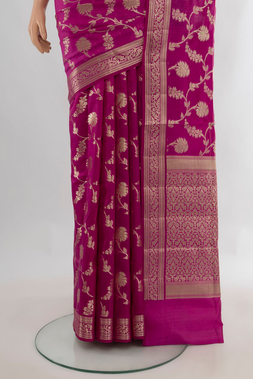 Pleats and pallu of Pure Silk Magenta Banarasi Raw Saree with Zari Butta on the body and Zari Border. 