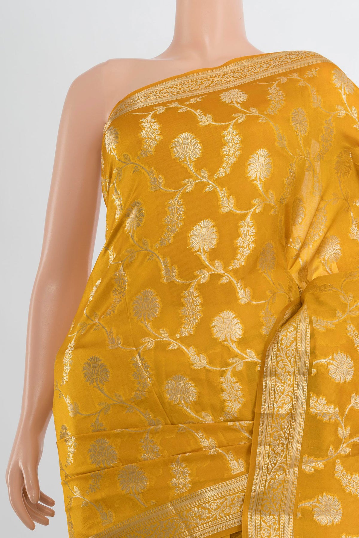 Border image of Pure Silk Mustard Banarasi Raw Saree with Zari Butta on the body and Silk Border. 