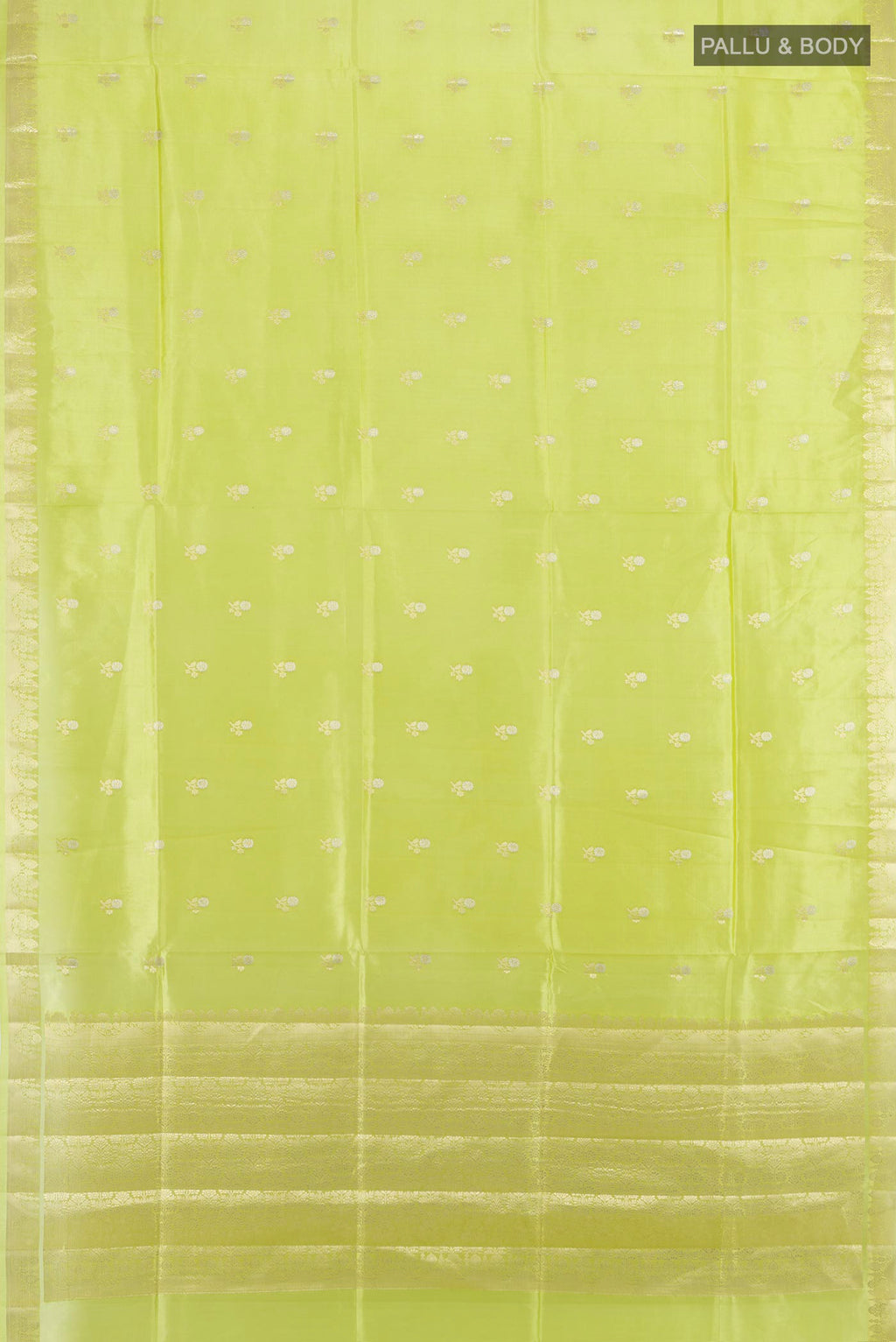Flat view of Pista Green Banarasi Raw Silk Saree with Zari Butta on the body and Silk Border. 