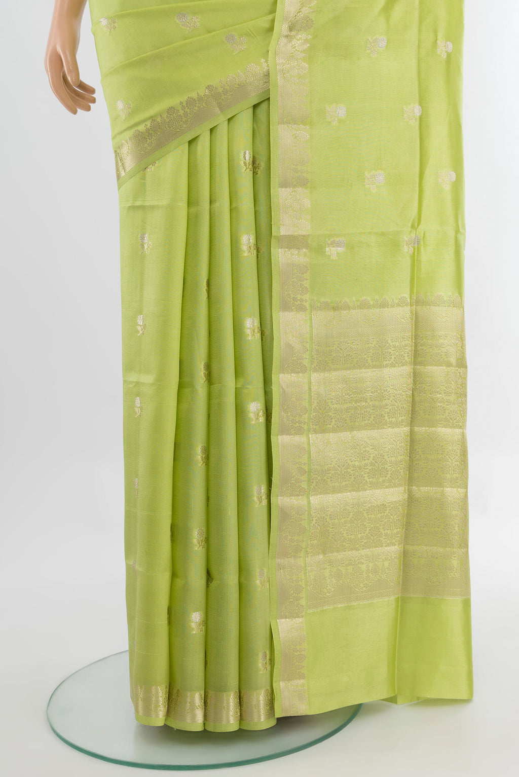 Pleats and pallu of Pista Green Banarasi Raw Silk Saree with Zari Butta on the body and Silk Border. 