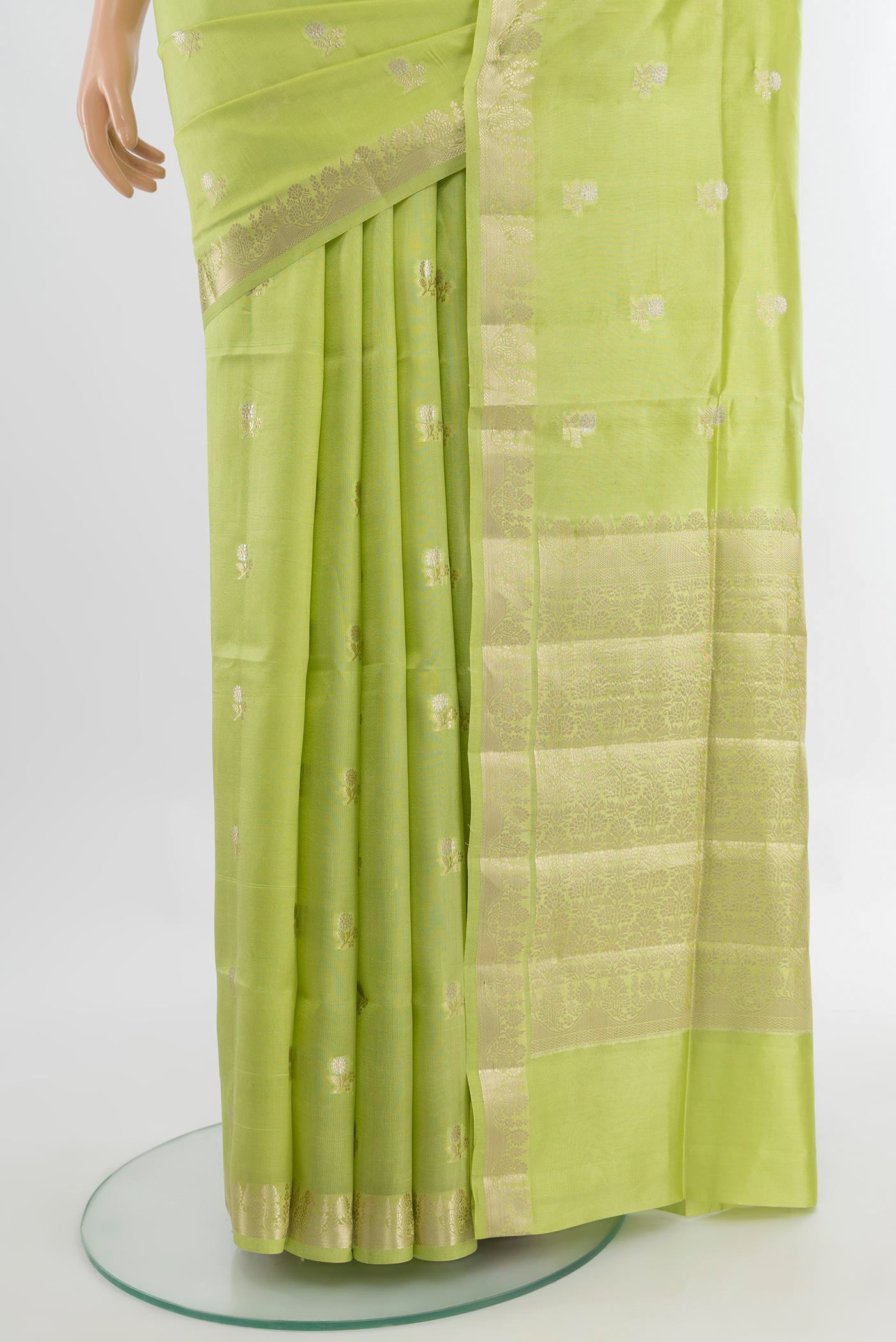 Pleats and pallu of Pista Green Banarasi Raw Silk Saree with Zari Butta on the body and Silk Border. 