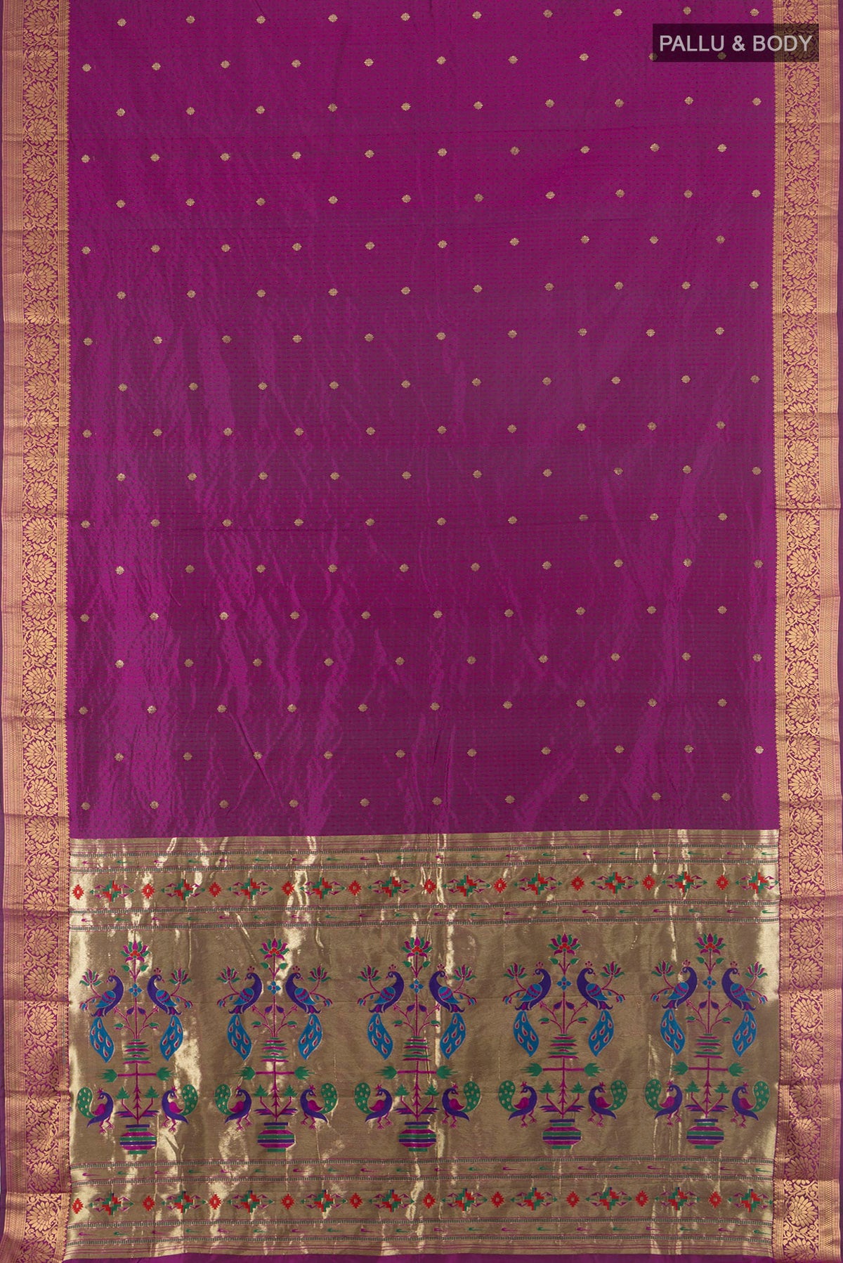 Flat view of Pure Silk Purple Bangalore Saree with Jacquard With Zari Butta on the body and Zari Border. 