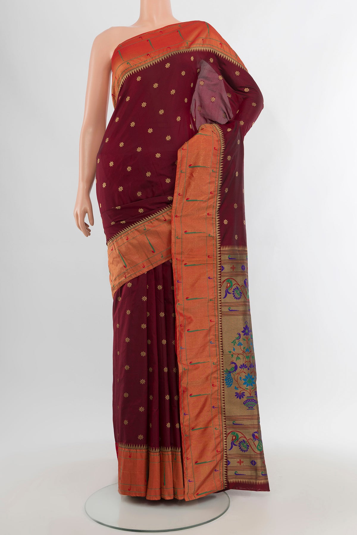 Maroon Bangalore Silk - kadyal Saree with Zari Butta on the body and Zari Border.  displayed on a mannequin