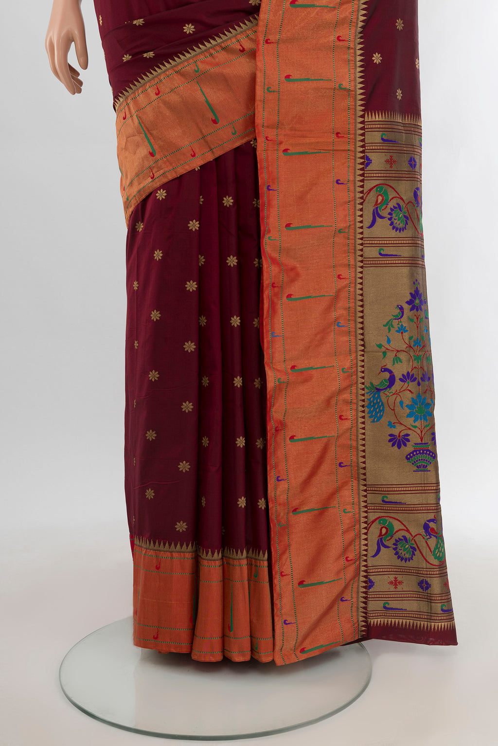 Pleats and pallu of Maroon Bangalore Silk - kadyal Saree with Zari Butta on the body and Zari Border. 