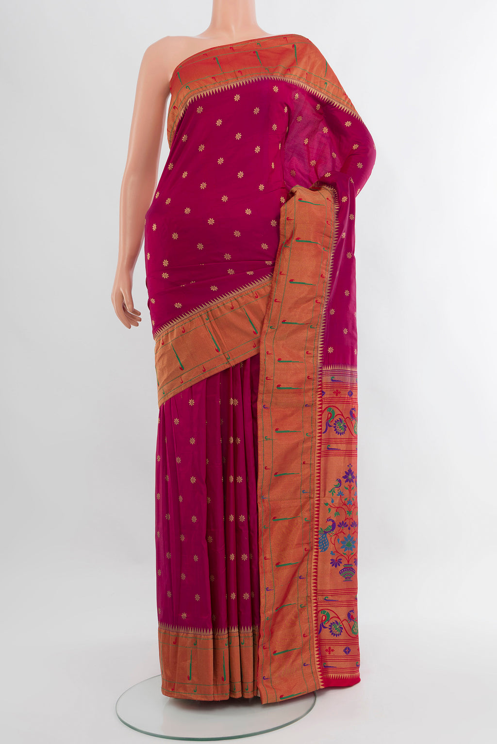 Magenta Paithani Silk Saree with Zari Butta on the body and Paithani Border.  displayed on a mannequin