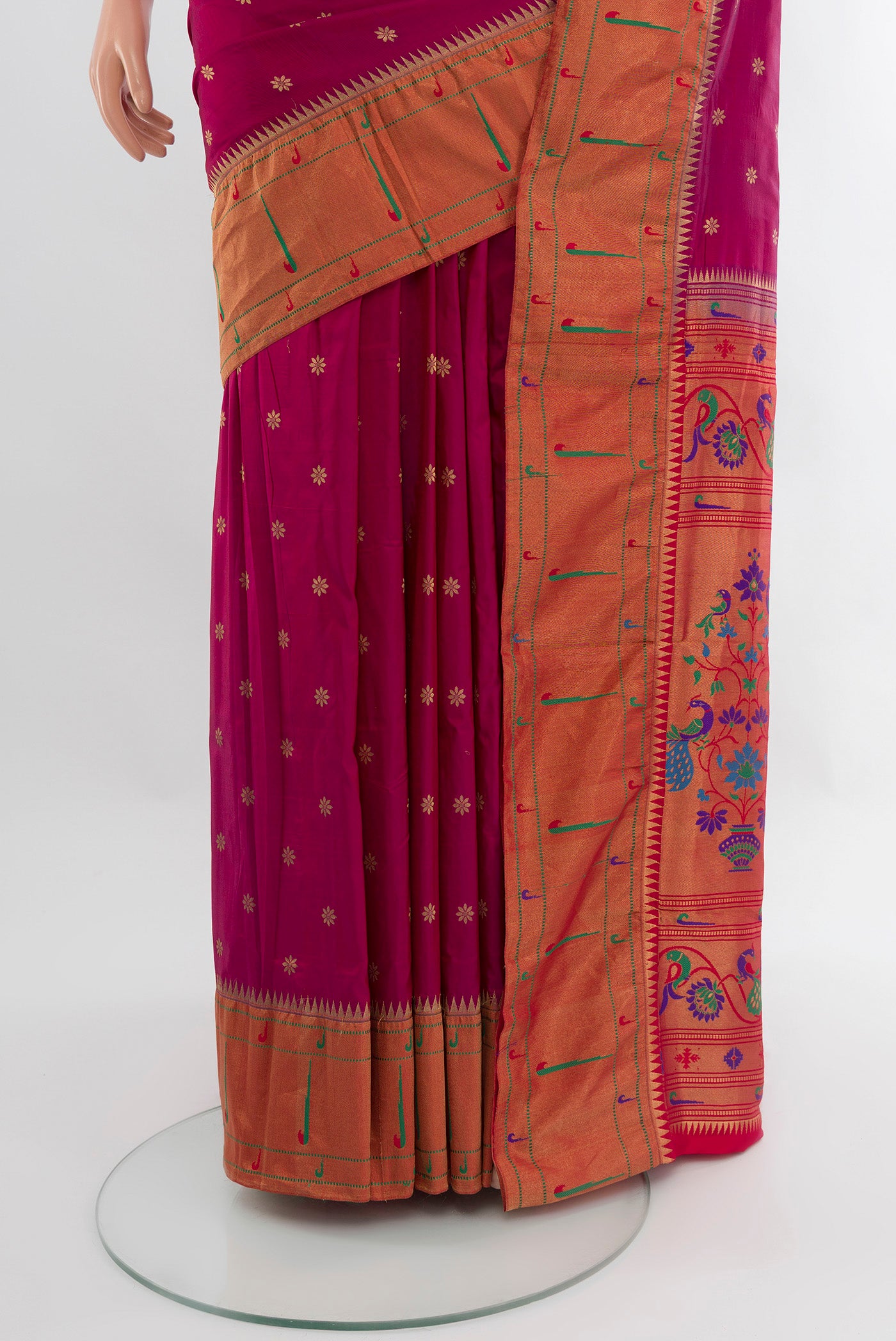 Pleats and pallu of Magenta Paithani Silk Saree with Zari Butta on the body and Paithani Border. 