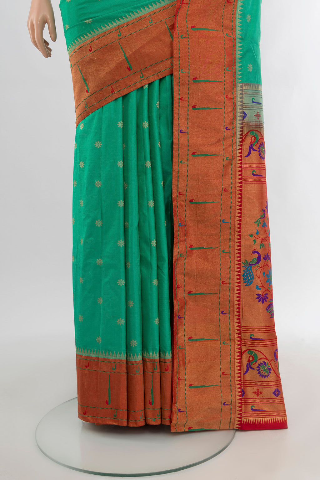 Pleats and pallu of Turquoise Paithani Silk Saree with Zari Butta on the body and Paithani Border. 