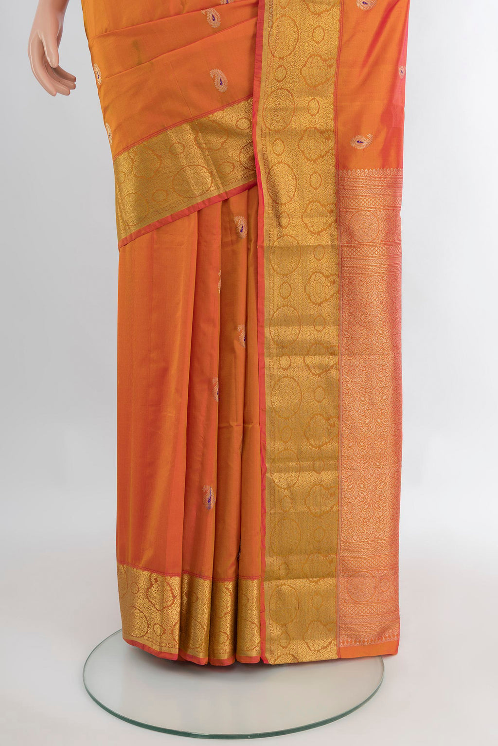 Pleats and pallu of Brick Orange Bangalore Silk Saree with Zari Butta on the body and Zari Border. 