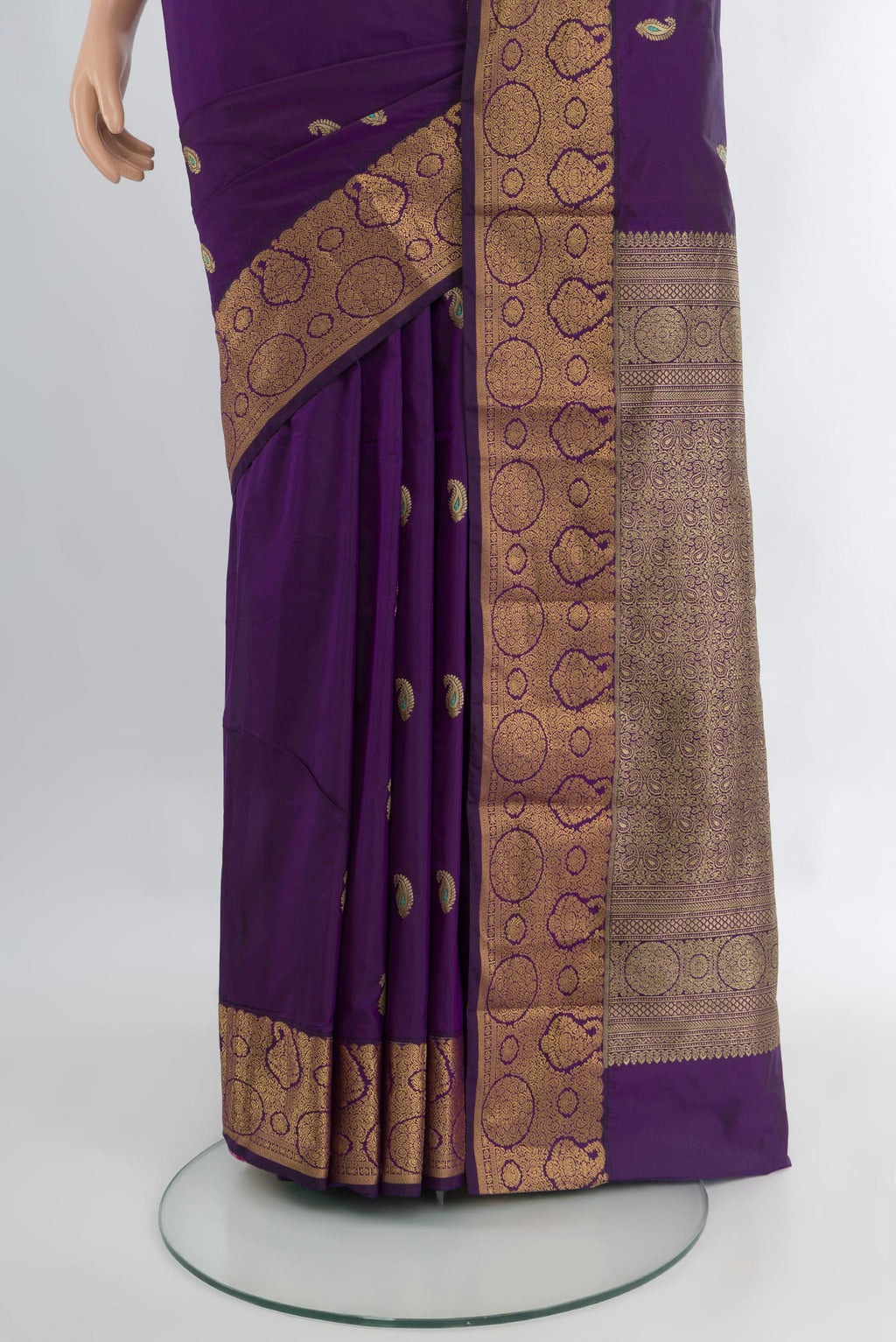 Pleats and pallu of Violet Blended Bangalore Silk Saree with Zari Butta on the body and Zari Border. 