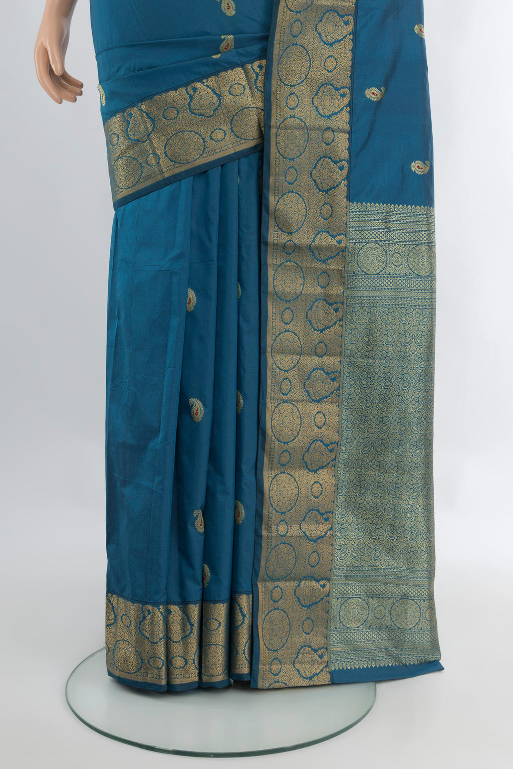Pleats and pallu of Blue Blended Bangalore Silk Saree with Zari Butta on the body and Zari Border. 