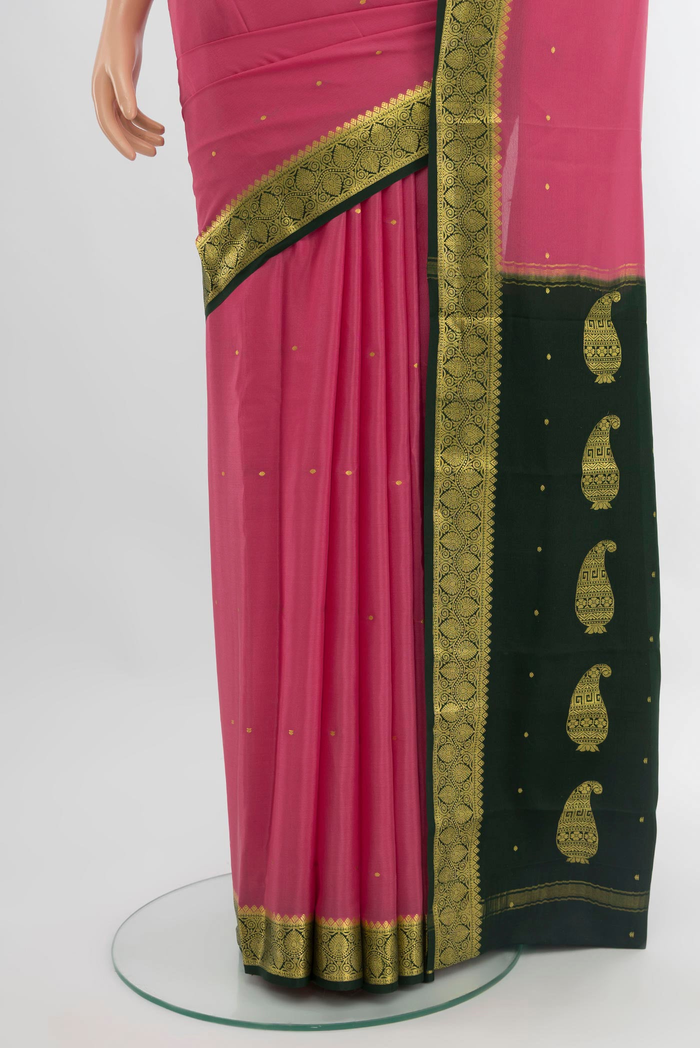 Pleats and pallu of Pink Mysore Crepe Saree with Zari Butta on the body and Zari Border. 