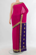 Rani Pink Mysore Crepe Saree with Zari Butta on the body and Zari Border.  displayed on a mannequin