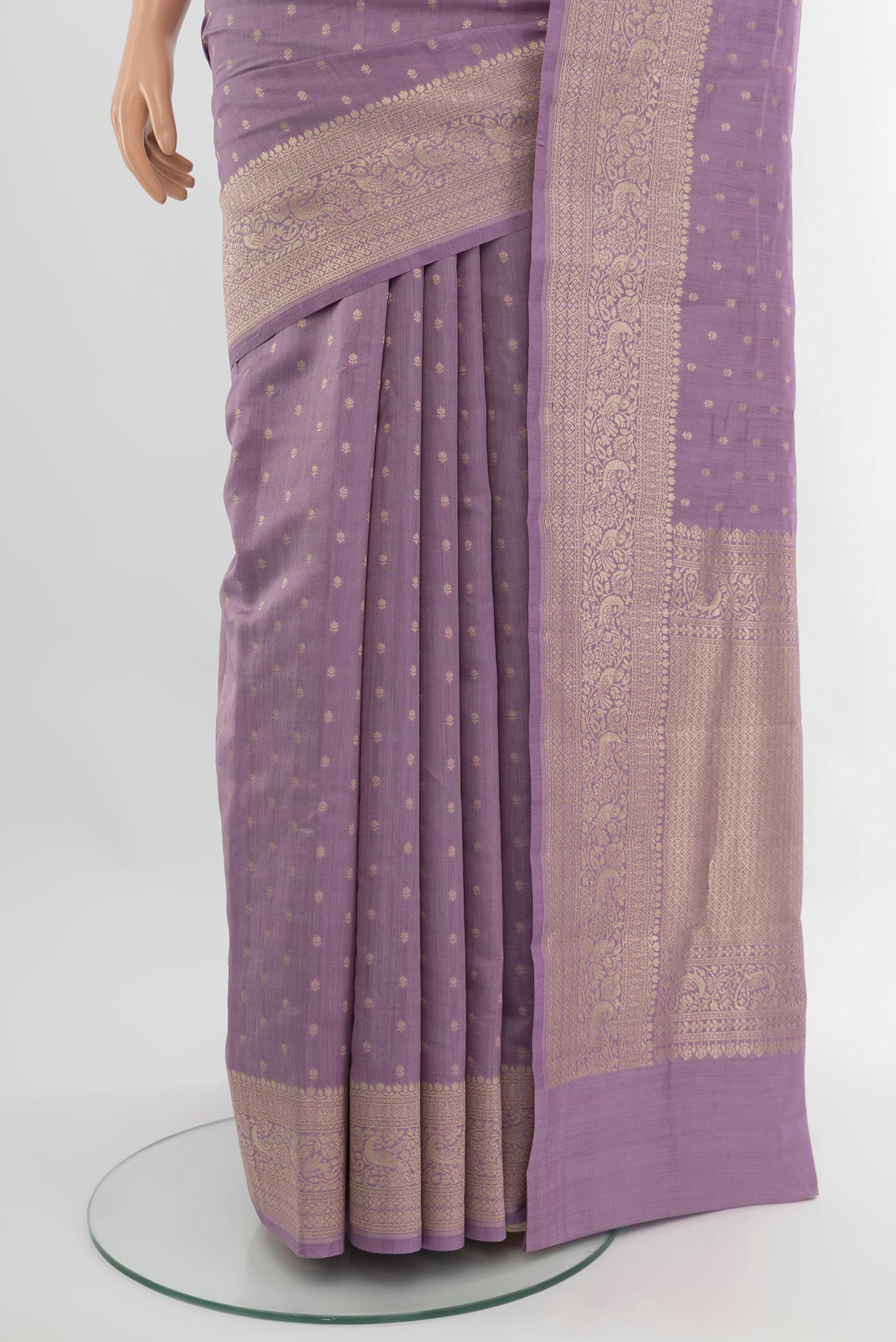 Pleats and pallu of Lavender Banarasi Raw Silk Saree with Zari Butta on the body and Zari Border. 