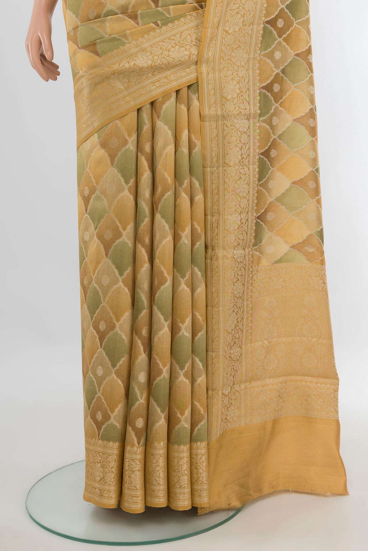 Pleats and pallu of Pure Silk Sandal Banarasi Tussar Saree with Zari Butta on the body and Zari Border. 
