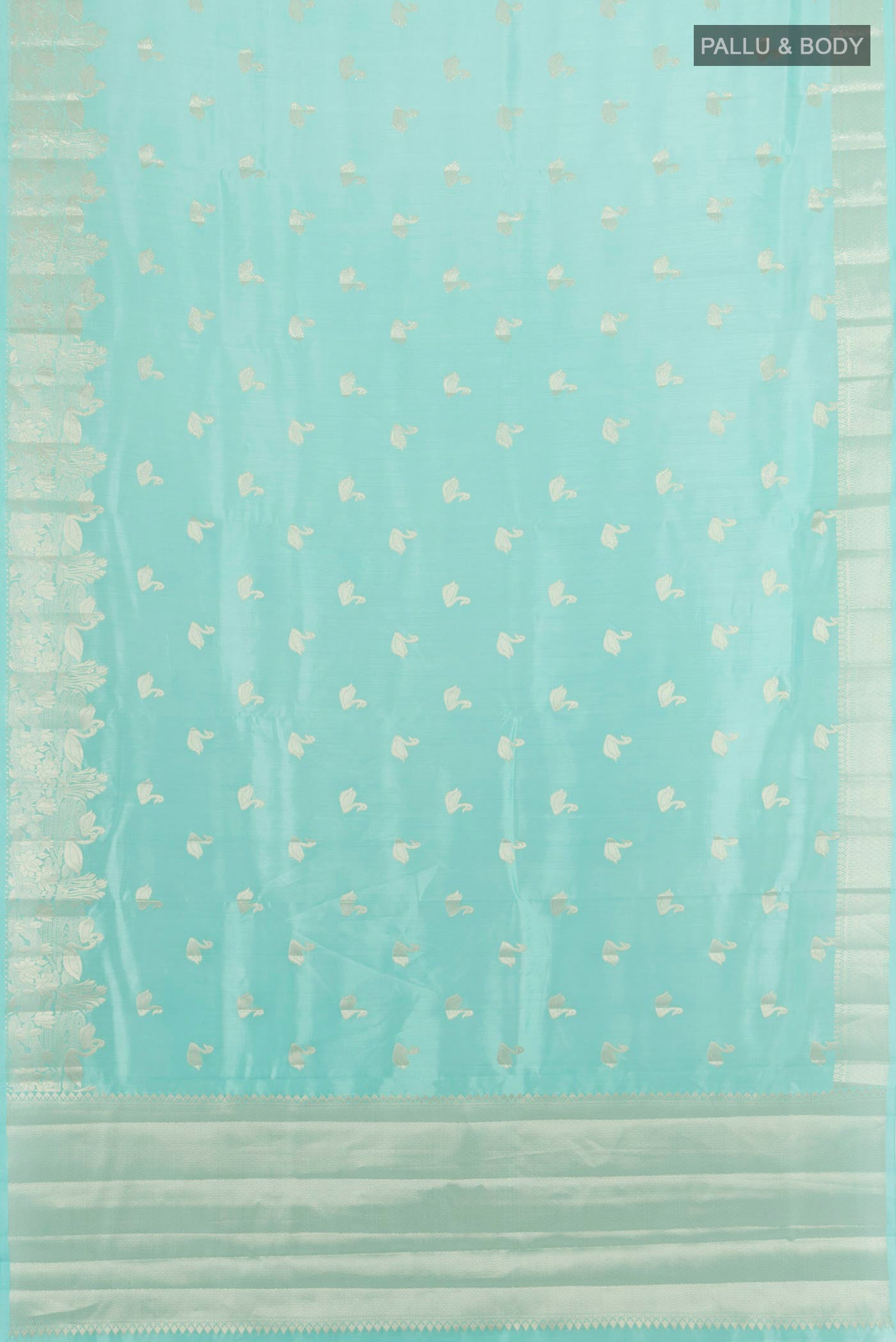 Flat view of Sky Blue Banarasi Raw Silk Saree with Zari Butta on the body and Zari Border. 