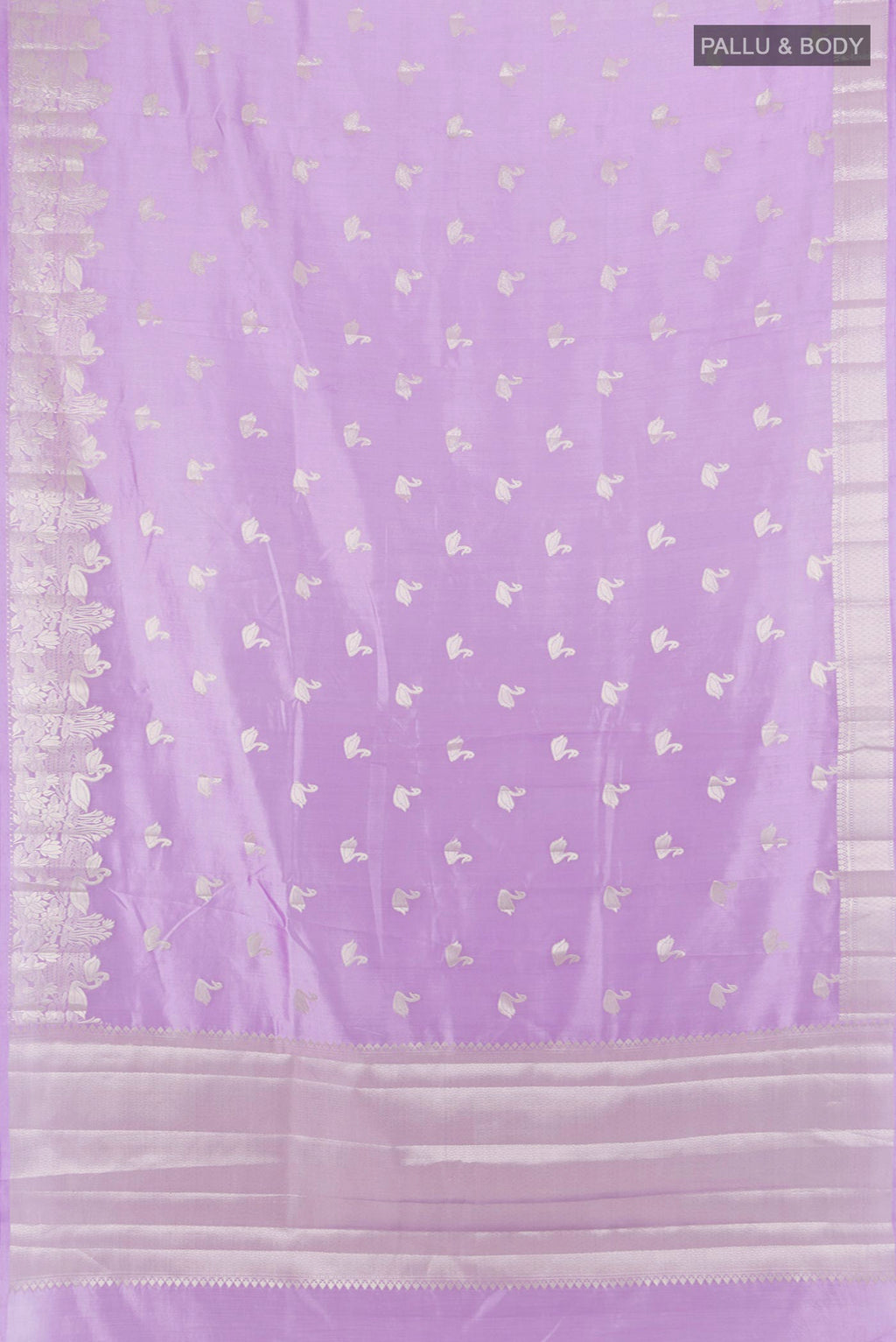 Flat view of Pure Silk Lavender Banarasi Raw Saree with Zari Butta on the body and Zari Border. 