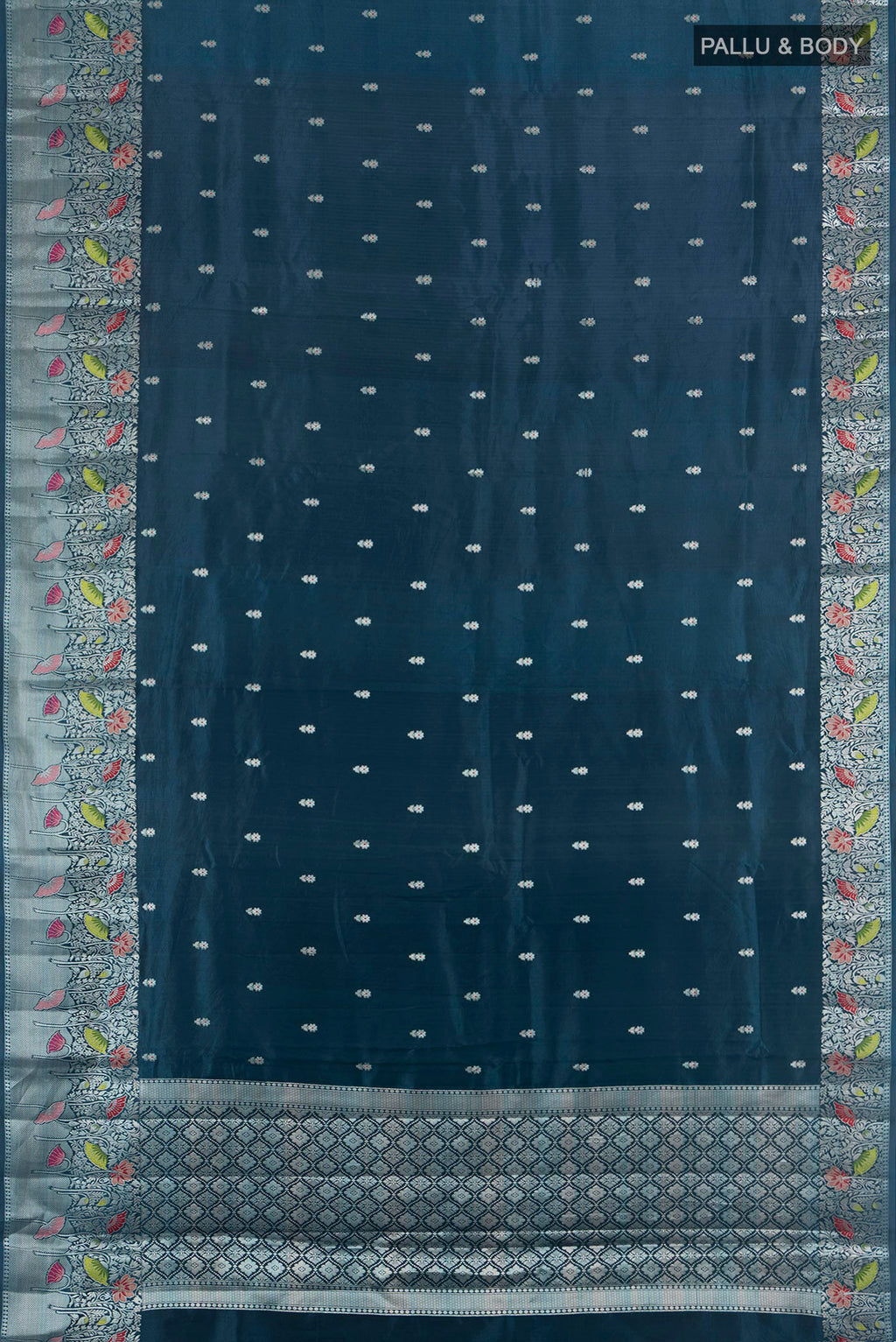 Flat view of Pure Silk Teal Banarasi Raw Saree with Zari Butta on the body and Zari Border. 