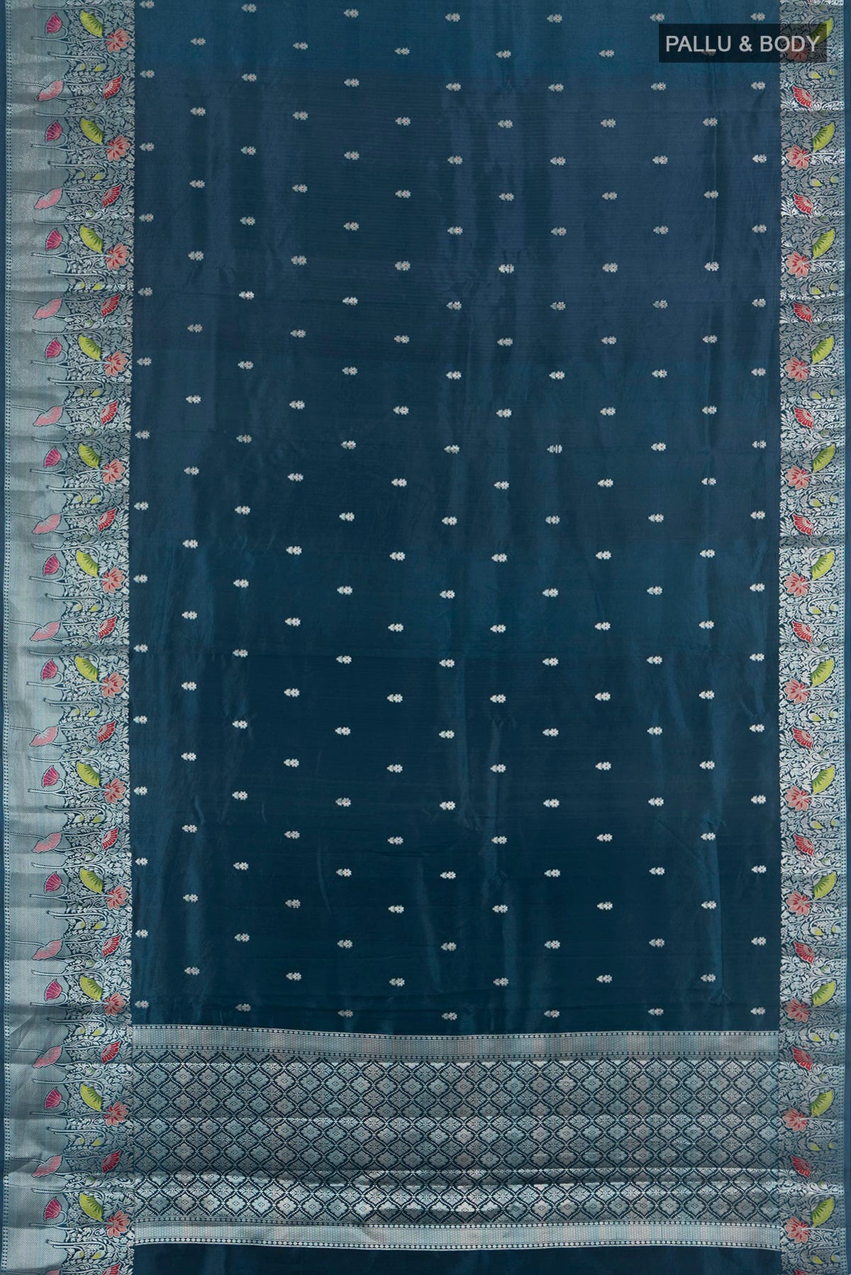 Flat view of Pure Silk Teal Banarasi Raw Saree with Zari Butta on the body and Zari Border. 