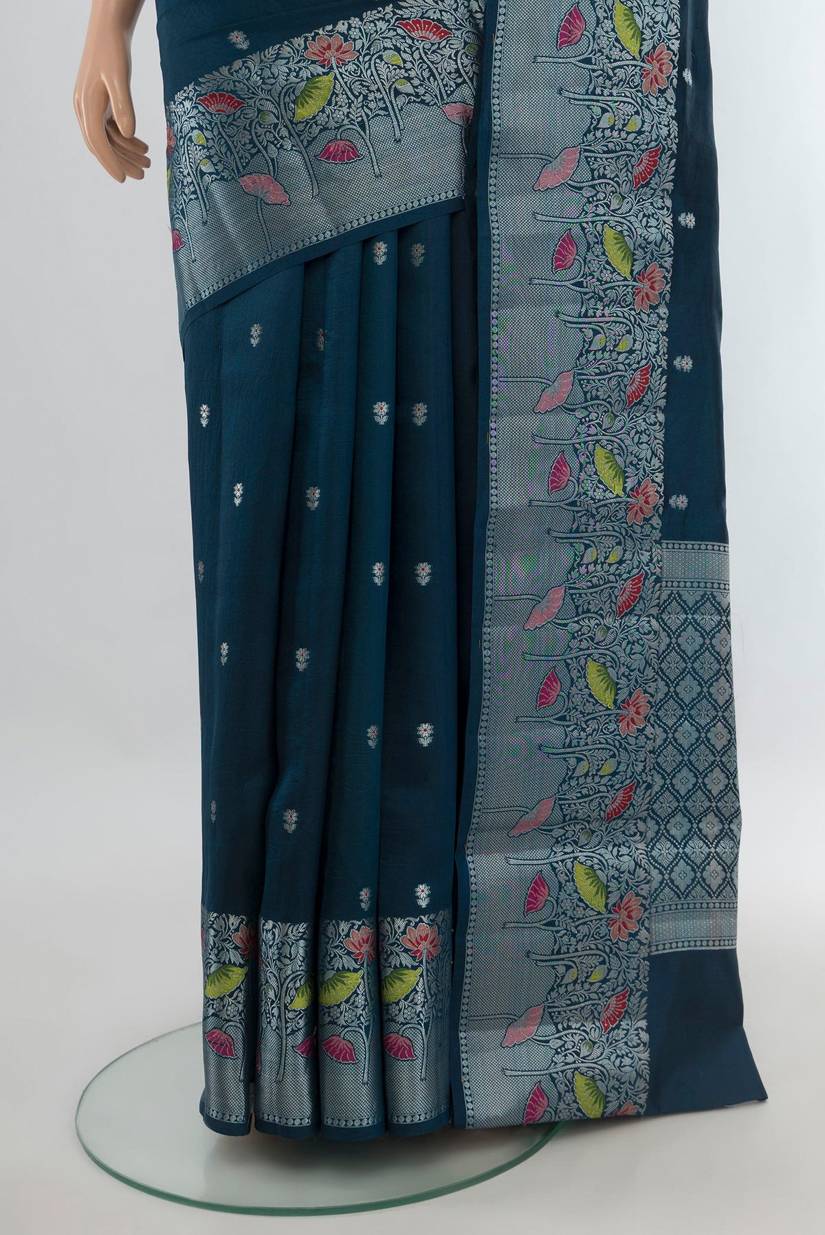 Pleats and pallu of Pure Silk Teal Banarasi Raw Saree with Zari Butta on the body and Zari Border. 