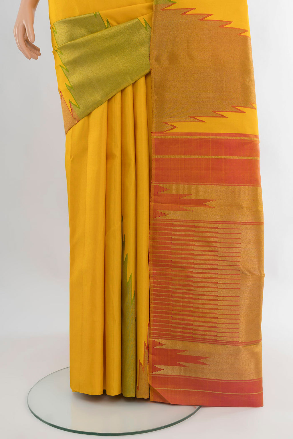 Pleats and pallu of Pure Silk Pure Zari Yellow Kanjivaram Saree with Plain Body and Temple Border. 