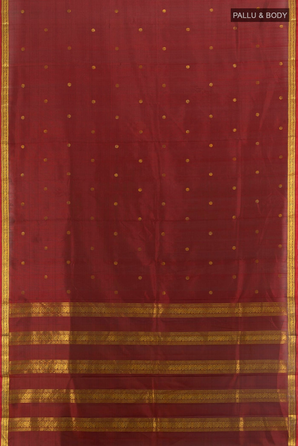 Flat view of Maroon Kanchipuram Silk Saree with Zari Butta on the body and Zari Border. 