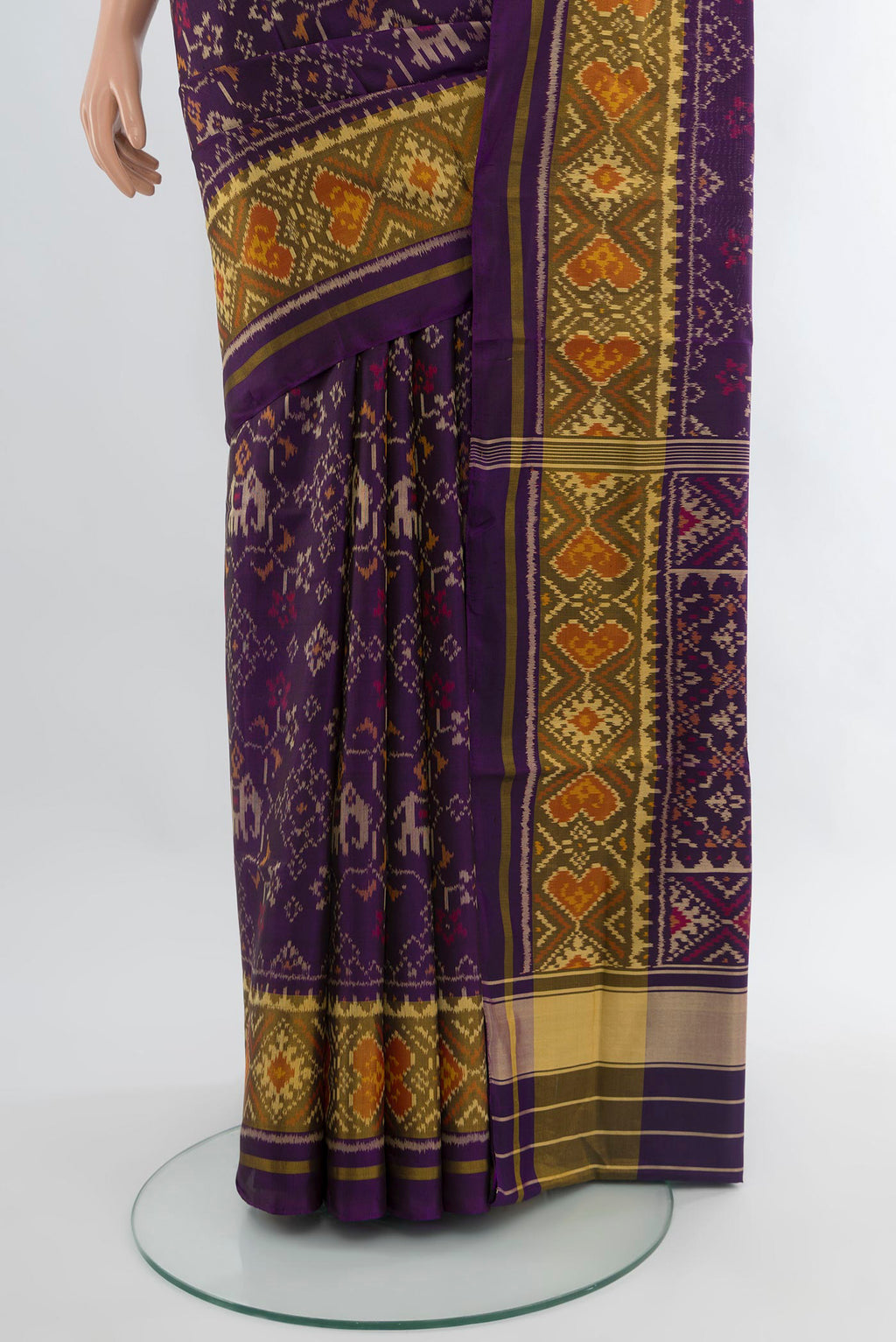 Pleats and pallu of Violet Rajkot Patola Silk Saree with Pure Ikat on the body and Ikat Border. 