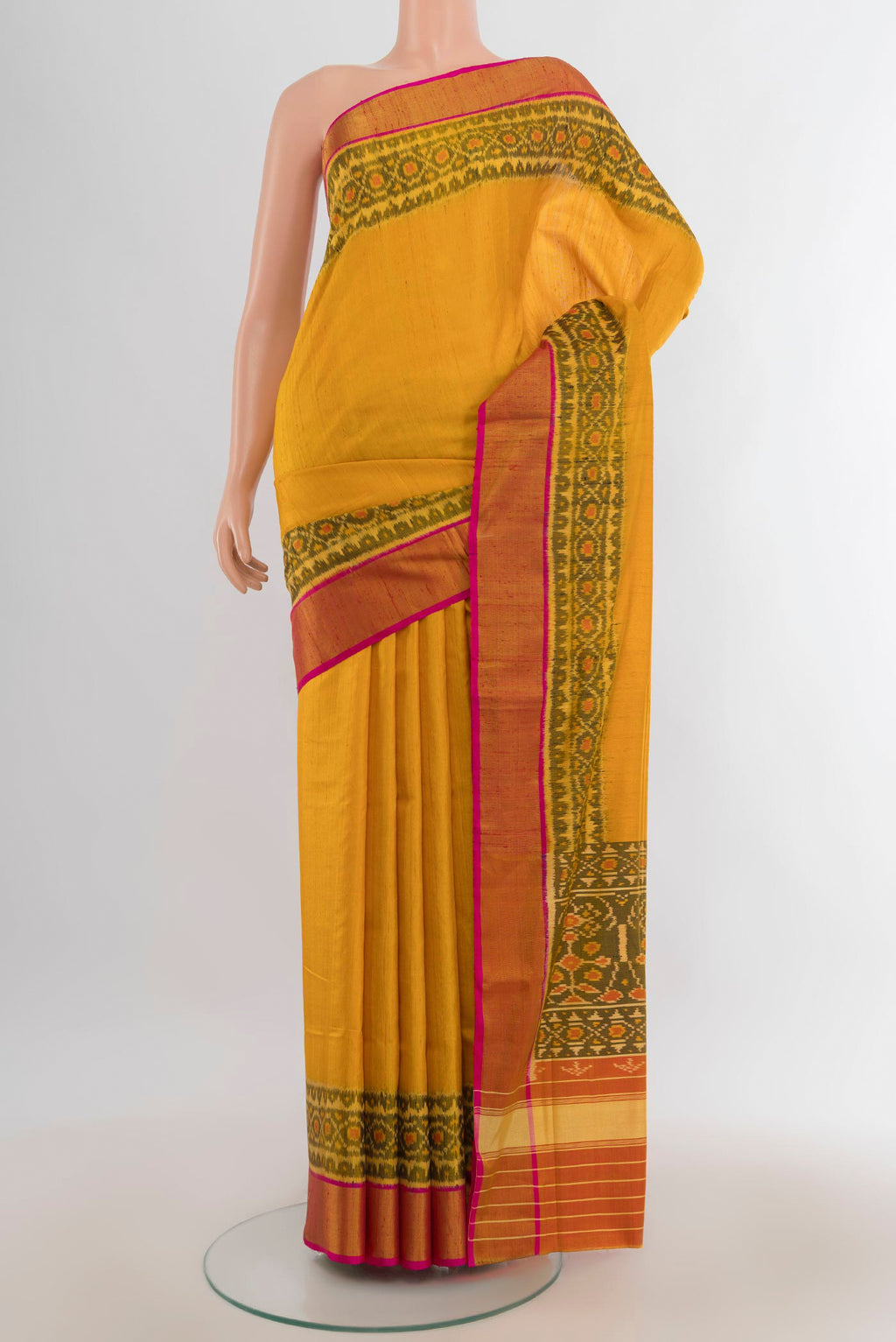 Pure Silk Multi Color Rajkot Patola Saree with Ikat Print on the body and Silk Border.  displayed on a mannequin