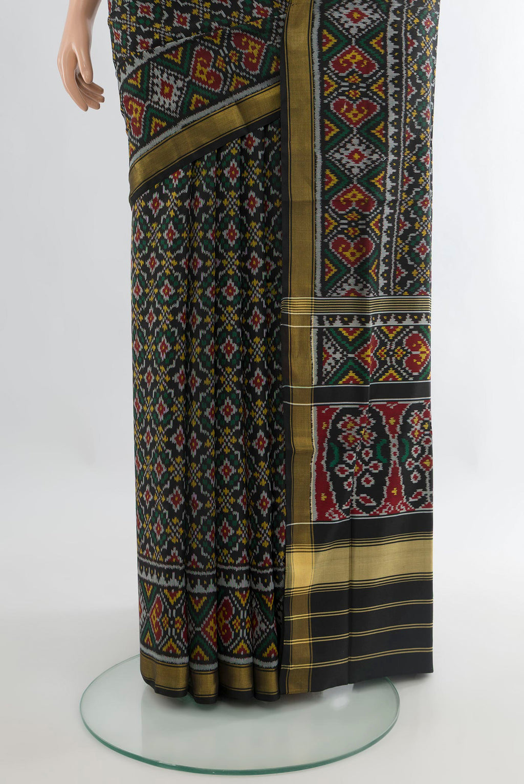 Pleats and pallu of Pure Silk Multi Color Rajkot Patola Saree with Pure Ikat on the body and Zari Border. 