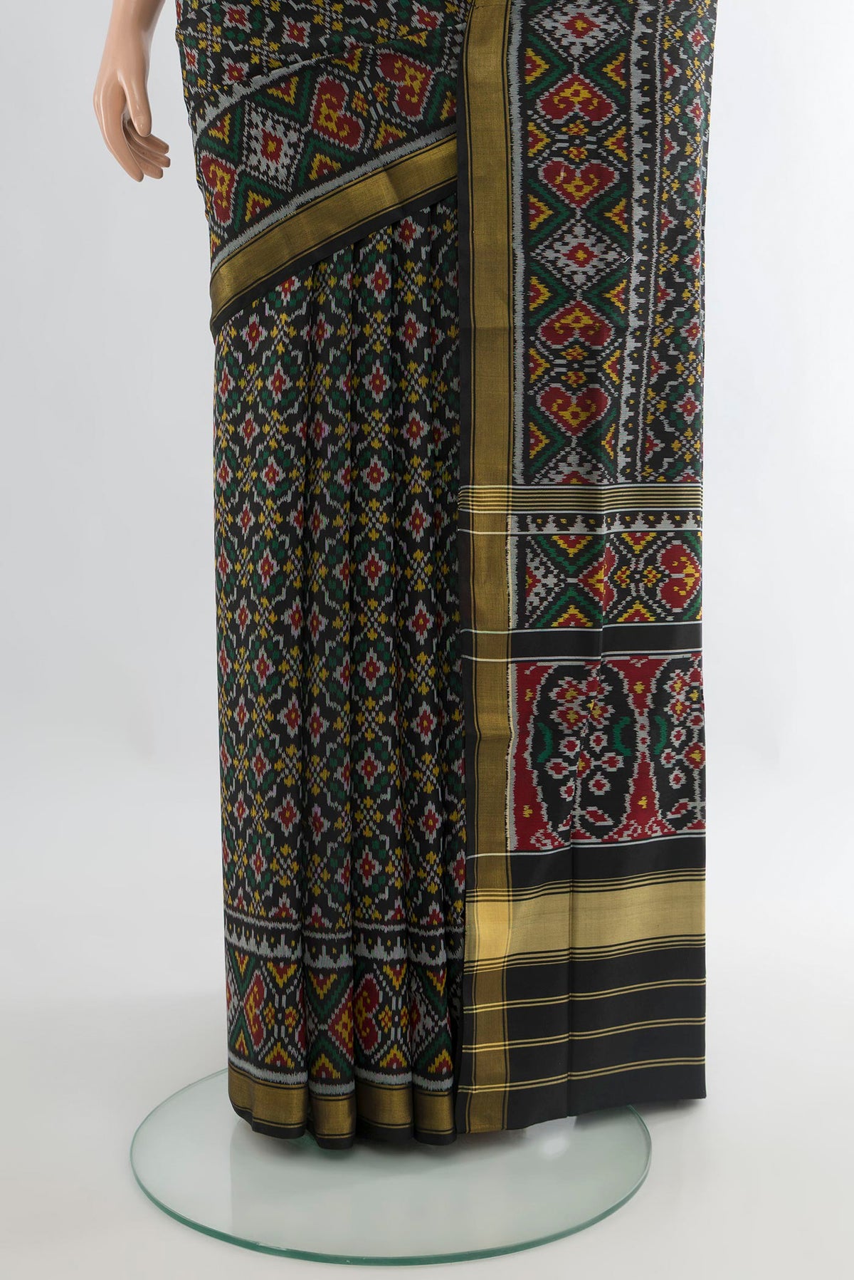 Pleats and pallu of Pure Silk Multi Color Rajkot Patola Saree with Pure Ikat on the body and Zari Border. 