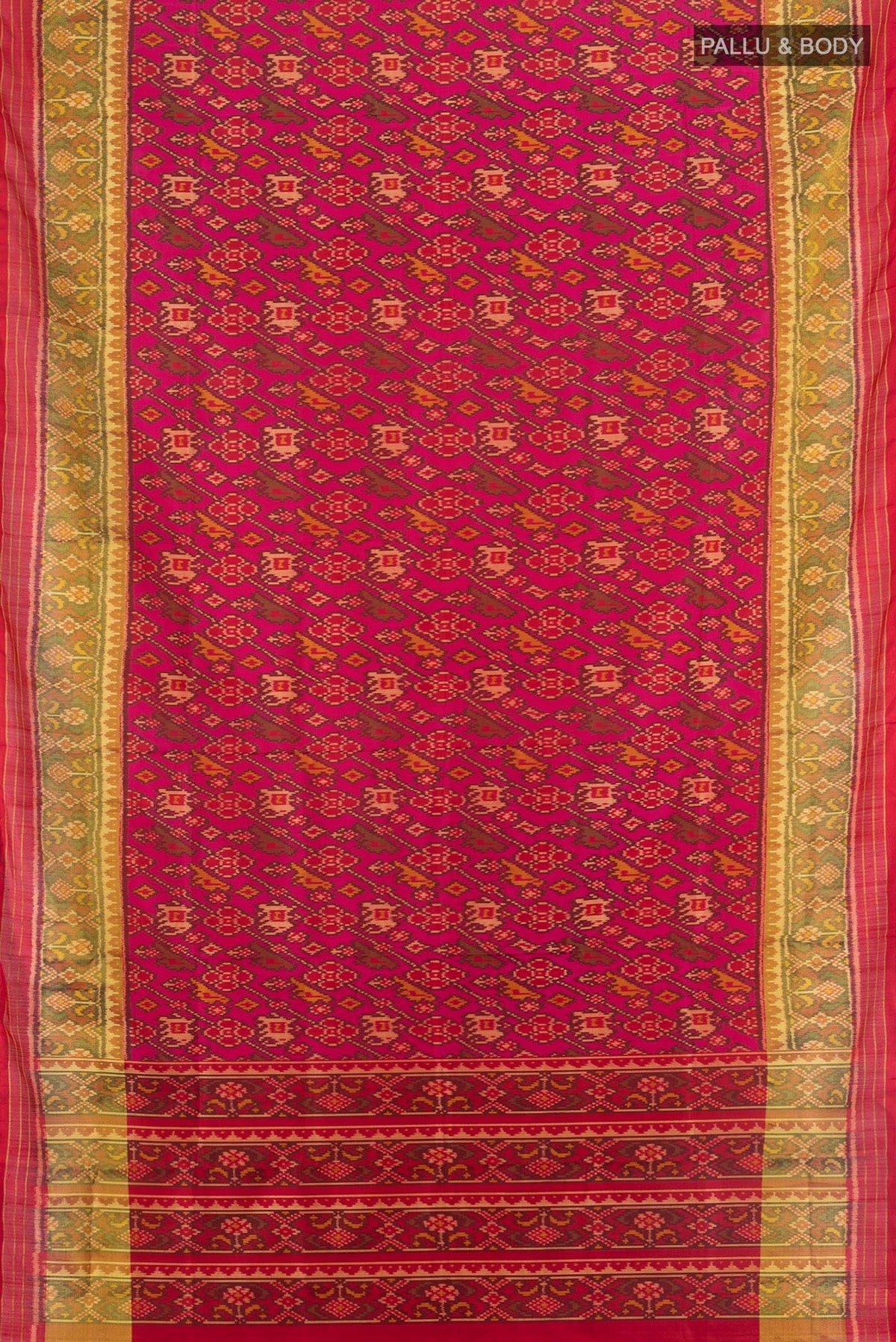 Flat view of Pure Silk Dark Pink Rajkot Patola Saree with Pure Ikat on the body and Ikat Border. 
