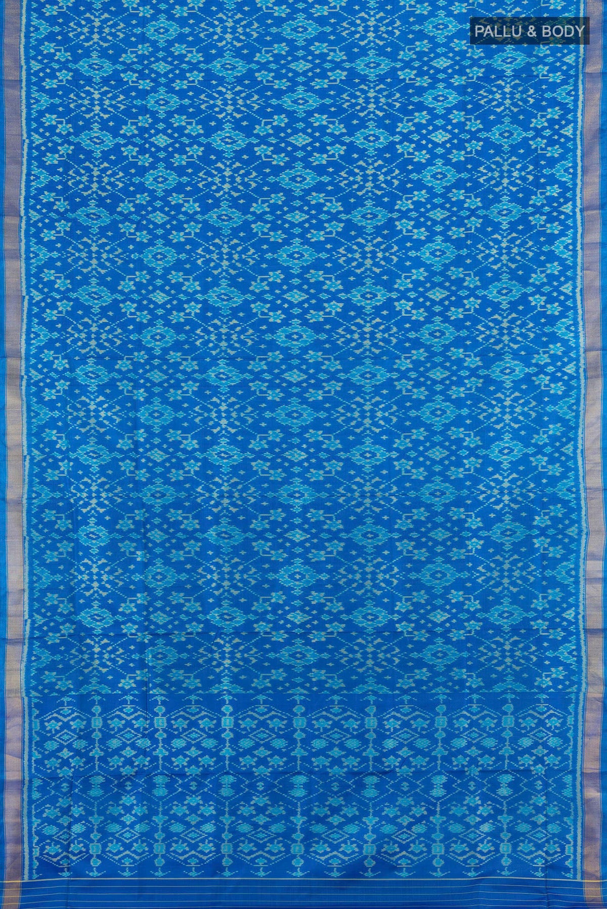 Flat view of Pure Silk Blue Rajkot Patola Saree with Pure Ikat on the body and Zari Border. 